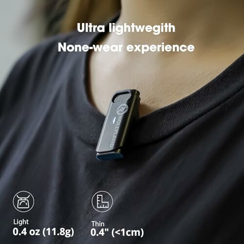 Person wearing a small lightweight clip-on device on shirt